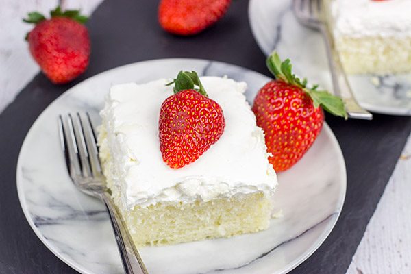 Celebrate fresh strawberry season with a batch of these Strawberry Shortcake Bars!  These are the perfect sweet treat for summer picnics and parties!