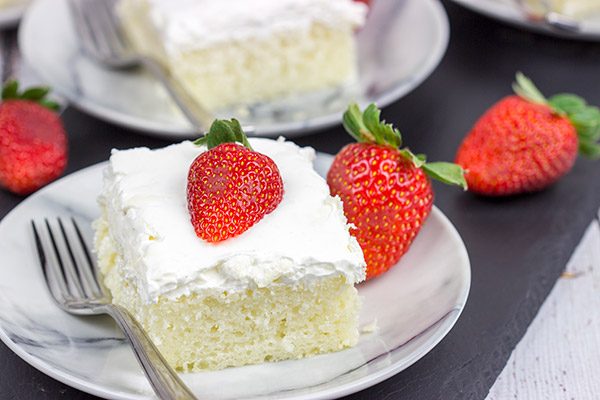 Celebrate fresh strawberry season with a batch of these Strawberry Shortcake Bars!  These are the perfect sweet treat for summer picnics and parties!