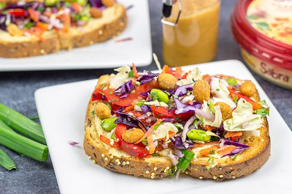 Looking for a fun and tasty brunch (or snack) idea?  This Thai Peanut Hummus Toast is easy and packed with flavor!