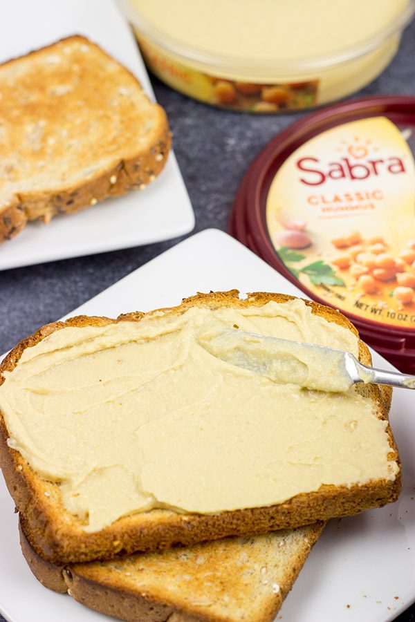 Looking for a fun and tasty brunch (or snack) idea?  This Thai Peanut Hummus Toast is easy and packed with flavor!