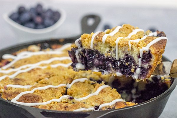 Topped with a cornmeal and brown sugar streusel, this Blueberry Streusel Cake is a delicious recipe for breakfast, brunch or dessert!  