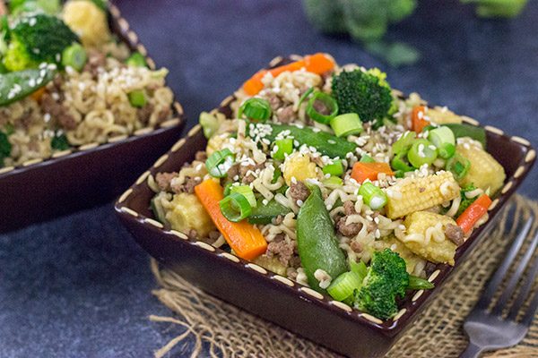 Looking for a fun way to use ramen packets?  Grab some veggies and whip up a batch of this tasty Beef Noodle Stir Fry!