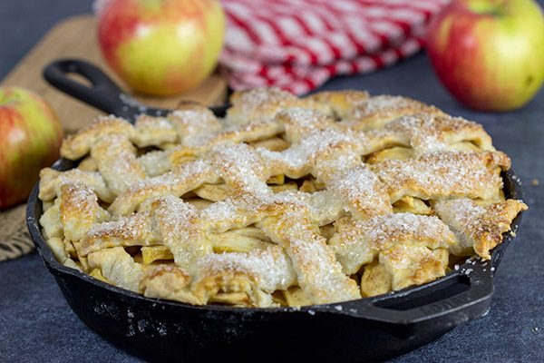 This Cast Iron Apple Pie uses a mix of Honeycrisps and green apples for the perfect combination of flavors.  Grab that cast iron skillet and bake a pie for dessert!