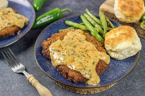 Chicken Fried Steak is a classic comfort food! Jalapeno Bacon Gravy takes this one to a whole new level of deliciousness!