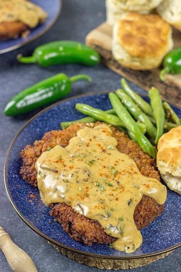 Chicken Fried Steak is a classic comfort food! Jalapeno Bacon Gravy takes this one to a whole new level of deliciousness!