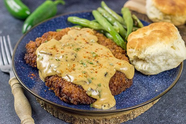 Chicken Fried Steak is a classic comfort food! Jalapeno Bacon Gravy takes this one to a whole new level of deliciousness!