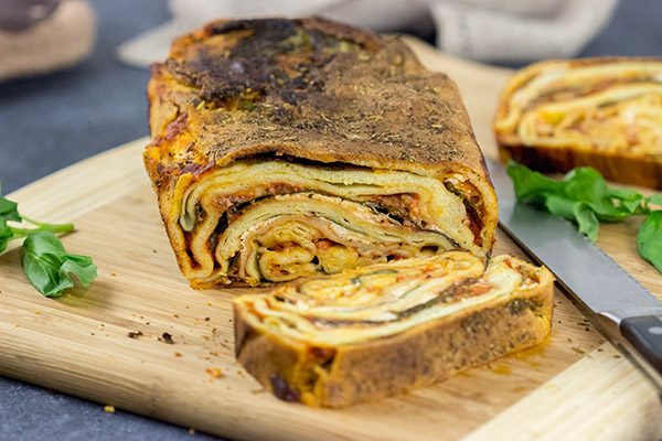 This Italian Lasagna Bread is a fun crossover between bread and pasta!  Crispy like flatbread on the outside, chewy like pasta on the inside...and 100% delicious!