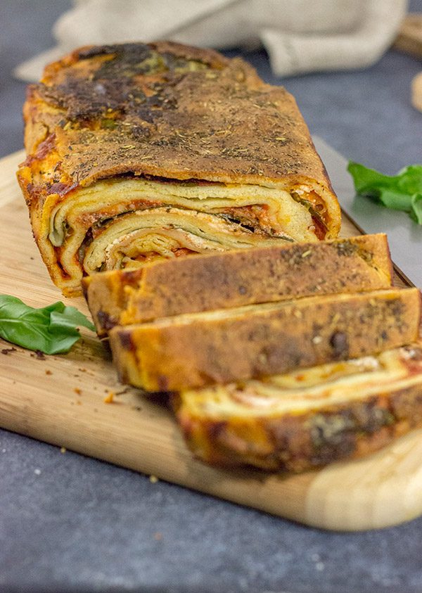 This Italian Lasagna Bread is a fun crossover between bread and pasta!  Crispy like flatbread on the outside, chewy like pasta on the inside...and 100% delicious!