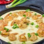 These New Orleans-style BBQ Shrimp and Grits don't involve barbecue sauce...but this recipe is a New Orleans classic for a reason!  Talk about delicious comfort food!
