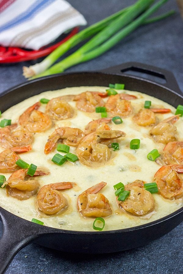 These New Orleans-style BBQ Shrimp and Grits don't involve barbecue sauce...but this recipe is a New Orleans classic for a reason! Talk about delicious comfort food!
