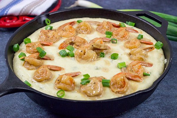 These New Orleans-style BBQ Shrimp and Grits don't involve barbecue sauce...but this recipe is a New Orleans classic for a reason!  Talk about delicious comfort food!