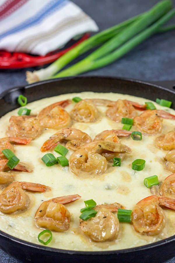 These New Orleans-style BBQ Shrimp and Grits don't involve barbecue sauce...but this recipe is a New Orleans classic for a reason!  Talk about delicious comfort food!