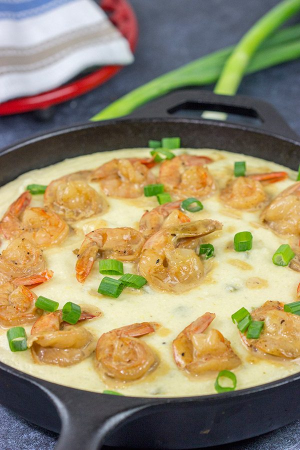 These New Orleans-style BBQ Shrimp and Grits don't involve barbecue sauce...but this recipe is a New Orleans classic for a reason!  Talk about delicious comfort food!