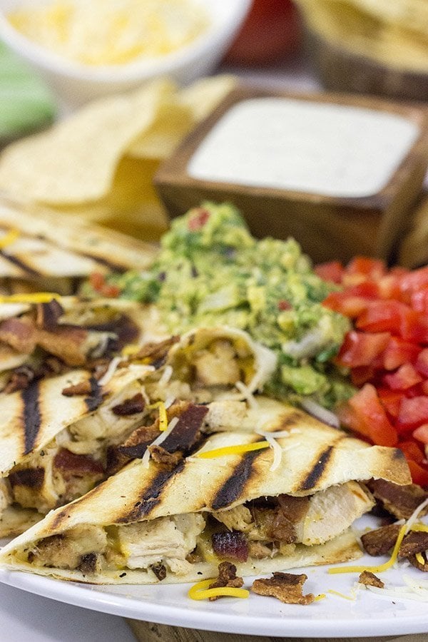 Turn up the flavor on dinner with these Chicken Bacon Ranch Quesadillas!  (And since the grill is hot, go ahead and grill the 'dillas, too!)