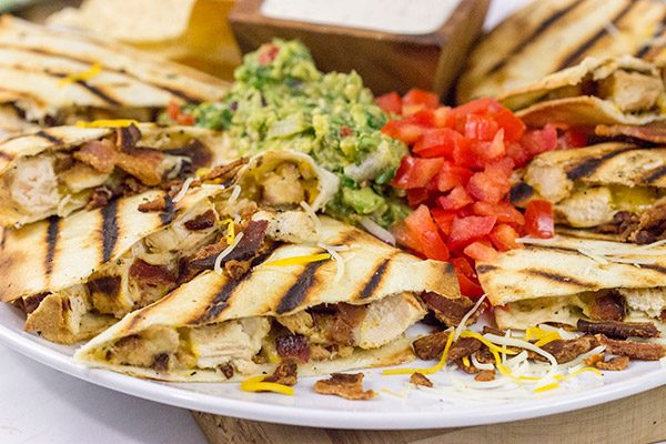 Turn up the flavor on dinner with these Chicken Bacon Ranch Quesadillas!  (And since the grill is hot, go ahead and grill the 'dillas, too!)
