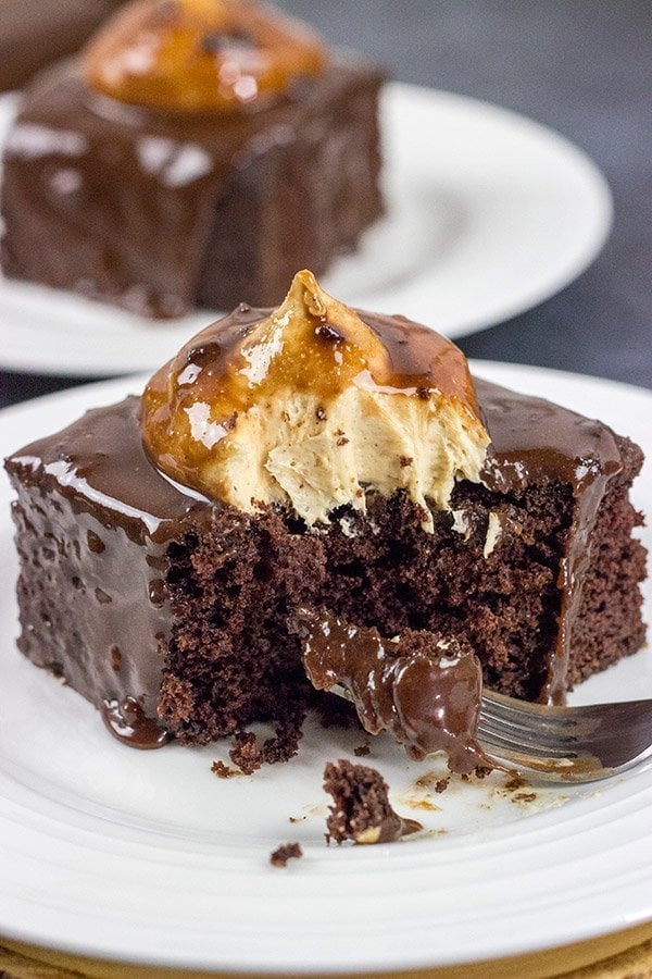 Decadent chocolate cake topped with a scoop of whipped peanut butter frosting...and then coated with chocolate glaze!  These Chocolate Peanut Butter Radio Bars are one heck of an awesome dessert!