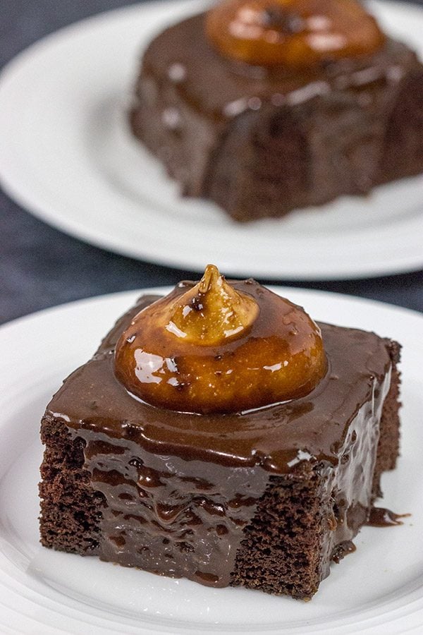 Decadent chocolate cake topped with a scoop of whipped peanut butter frosting...and then coated with chocolate glaze!  These Chocolate Peanut Butter Radio Bars are one heck of an awesome dessert!