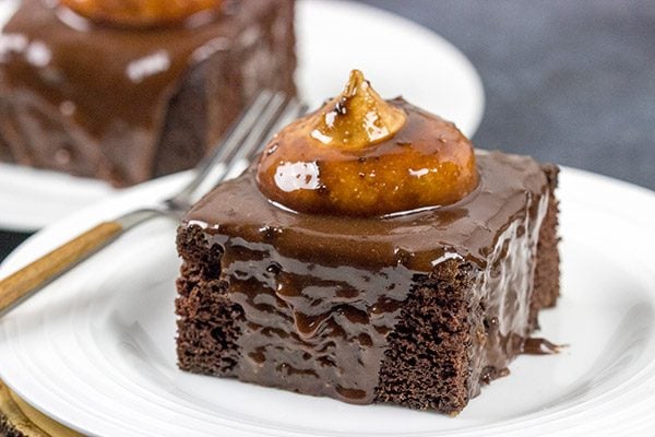 Decadent chocolate cake topped with a scoop of whipped peanut butter frosting...and then coated with chocolate glaze!  These Chocolate Peanut Butter Radio Bars are one heck of an awesome dessert!
