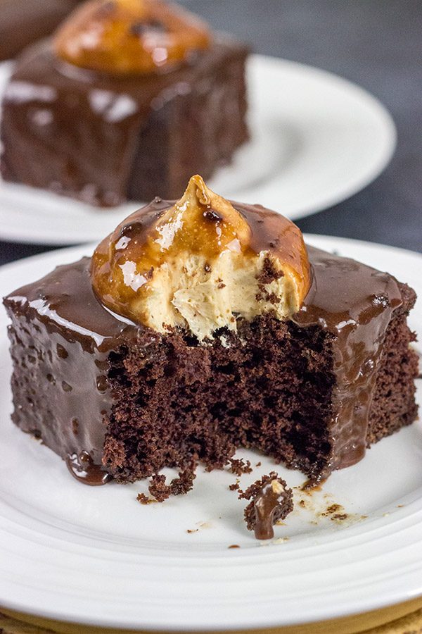 Decadent chocolate cake topped with a scoop of whipped peanut butter frosting...and then coated with chocolate glaze!  These Chocolate Peanut Butter Radio Bars are one heck of an awesome dessert!