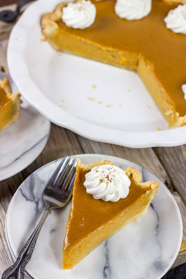 This Classic Pumpkin Pie features an extra silky pumpkin filling and a flaky pie crust.  It makes for one tasty sweet Autumn treat!