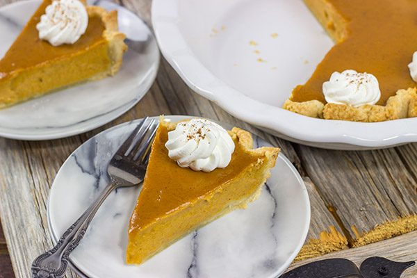This Classic Pumpkin Pie features an extra silky pumpkin filling and a flaky pie crust.  It makes for one tasty sweet Autumn treat!
