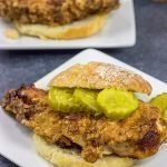 Fried Chicken and Biscuits is a classic recipe for a reason!  Homemade buttermilk biscuits topped with juicy fried chicken make for one heck of a comfort food meal!