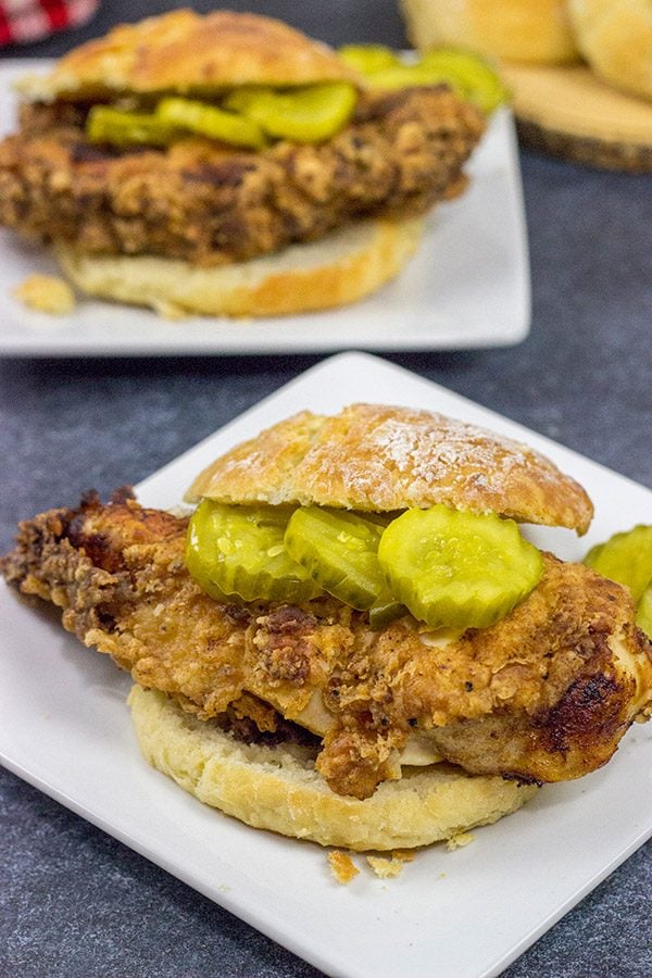 Fried Chicken and Biscuits is a classic recipe for a reason! Homemade buttermilk biscuits topped with juicy fried chicken make for one heck of a comfort food meal!