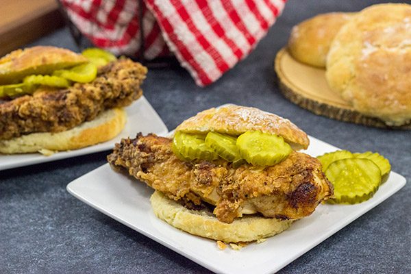 Fried Chicken and Biscuits is a classic recipe for a reason!  Homemade buttermilk biscuits topped with juicy fried chicken make for one heck of a comfort food meal!