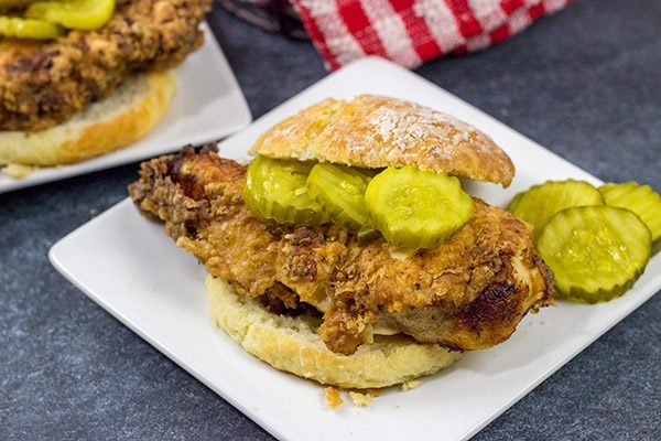 Fried Chicken and Biscuits is a classic recipe for a reason!  Homemade buttermilk biscuits topped with juicy fried chicken make for one heck of a comfort food meal!