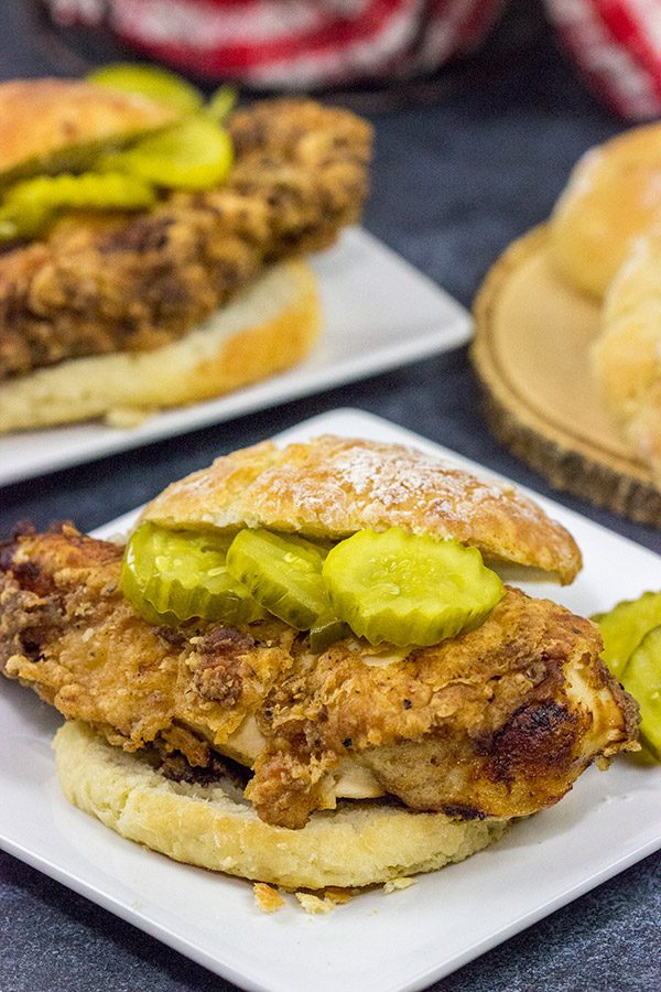 Fried Chicken and Biscuits is a classic recipe for a reason!  Homemade buttermilk biscuits topped with juicy fried chicken make for one heck of a comfort food meal!