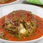 This Mozzarella-Stuffed Meatloaf is packed with comfort food flavor...and melty cheese!  This ain't your grandma's meatloaf recipe!