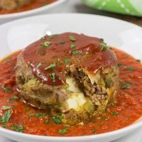 This Mozzarella-Stuffed Meatloaf is packed with comfort food flavor...and melty cheese! This ain't your grandma's meatloaf recipe!
