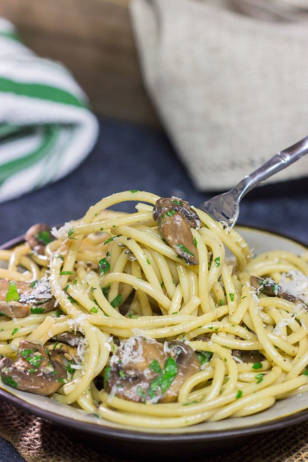 Get ready for some serious comfort food!  This Creamy Mushroom Carbonara features thick spaghetti coated in a creamy sauce with plenty of sauteed mushrooms.