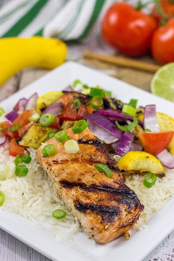 Turn up the dial on the grilled flavor with this Grilled Honey Lime Salmon with Grilled Veggies! This easy recipe is perfect for summer grilling in the backyard!