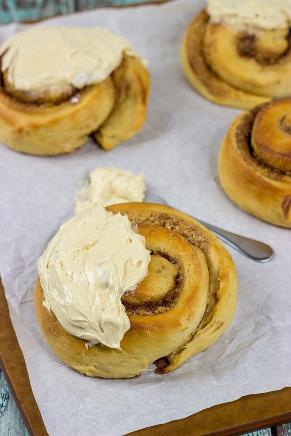 If you love peanut butter, then these Peanut Butter Cinnamon Rolls will be a new favorite!  Topped with a whipped peanut butter frosting, these rolls are a tasty breakfast or dessert!
