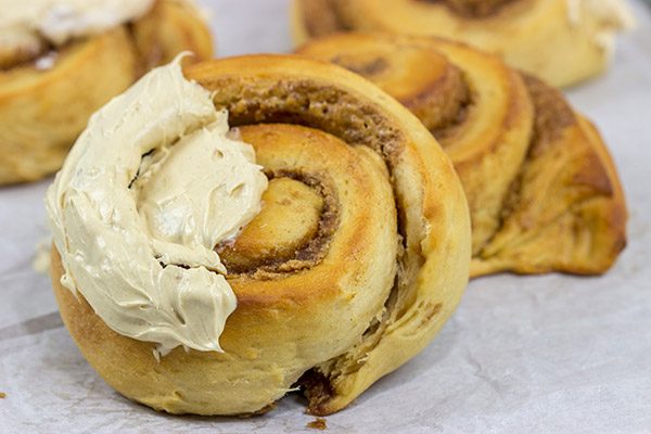 If you love peanut butter, then these Peanut Butter Cinnamon Rolls will be a new favorite!  Topped with a whipped peanut butter frosting, these rolls are a tasty breakfast or dessert!