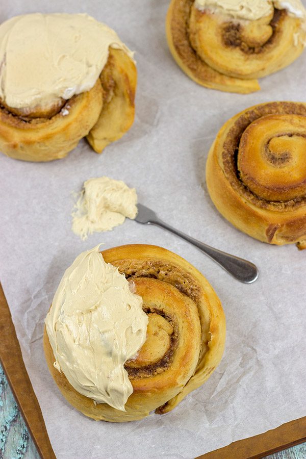 If you love peanut butter, then these Peanut Butter Cinnamon Rolls will be a new favorite!  Topped with a whipped peanut butter frosting, these rolls are a tasty breakfast or dessert!