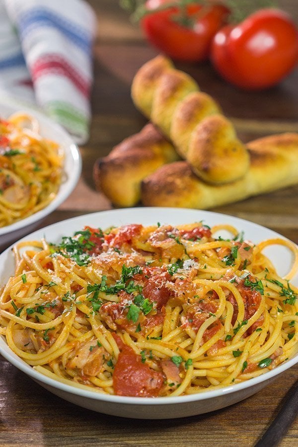 Spaghetti all'Amatriciana is a classic and delicious Italian pasta dish. It's loaded with layers of flavor, and it'll become a family favorite for sure!