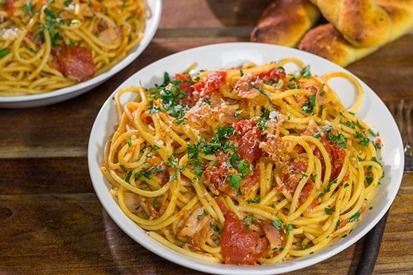 Spaghetti all'Amatriciana is a classic and delicious Italian pasta dish.  It's loaded with layers of flavor, and it'll become a family favorite for sure!