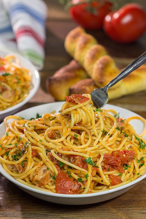 Spaghetti all'Amatriciana is a classic and delicious Italian pasta dish.  It's loaded with layers of flavor, and it'll become a family favorite for sure!