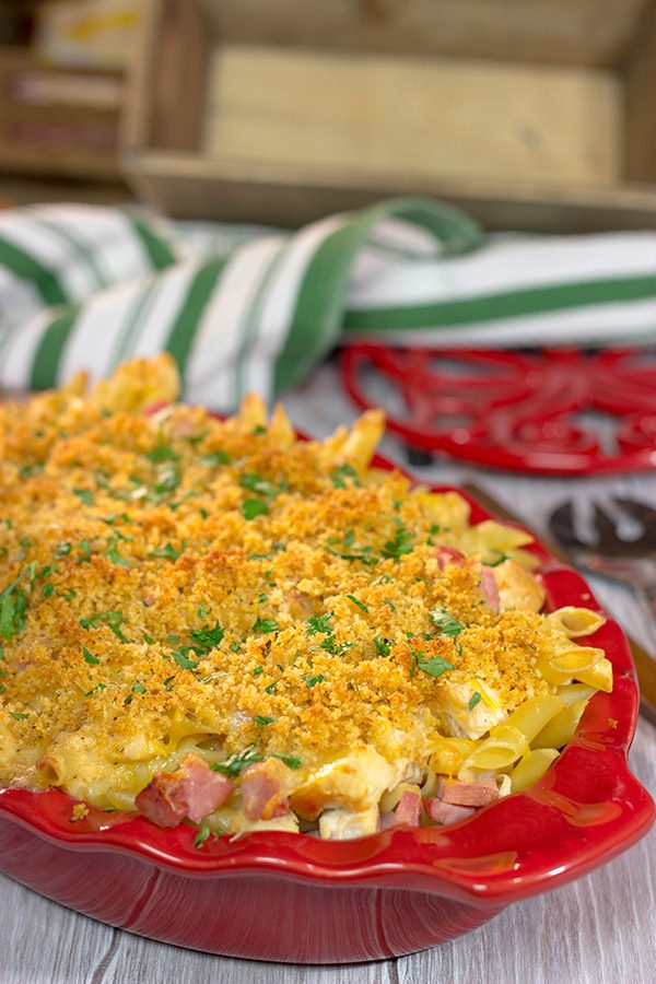 Say hello to a fun new pasta bake!  This Chicken Cordon Bleu Pasta features a delicious combination of chicken, ham, cheese and pasta.  Bake it up for dinner tonight!