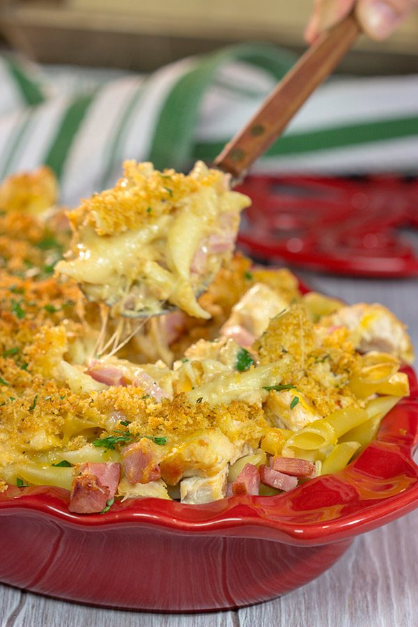 Say hello to a fun new pasta bake!  This Chicken Cordon Bleu Pasta features a delicious combination of chicken, ham, cheese and pasta.  Bake it up for dinner tonight!