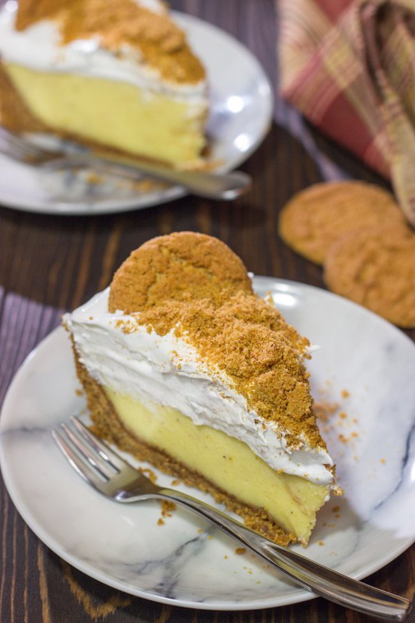 Baked in a gingersnap cookie crust, this Eggnog Cream Pie makes for one heck of a delicious treat during the holidays!  Cheers!