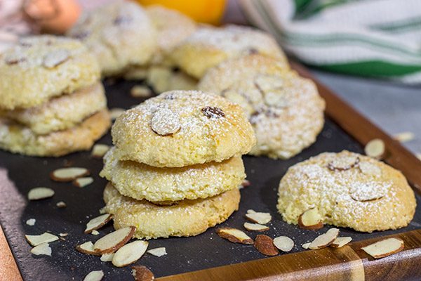 These Italian Almond Cookies are packed with almond and citrus flavor!  With a light, chewy texture, these tasty cookies pair well with a glass dessert wine.  Cheers!
