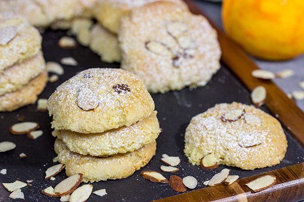 These Italian Almond Cookies are packed with almond and citrus flavor!  With a light, chewy texture, these tasty cookies pair well with a glass dessert wine.  Cheers!