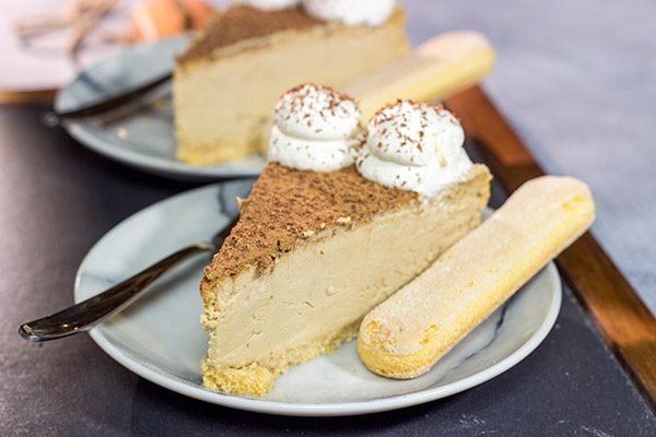 Featuring a ladyfinger crust topped with espresso cheesecake, this Tiramisu Cheesecake is a fun twist on a classic Italian dessert!