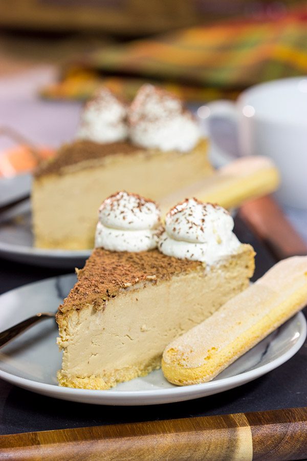 Featuring a ladyfinger crust topped with espresso cheesecake, this Tiramisu Cheesecake is a fun twist on a classic Italian dessert!