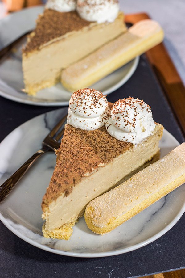 Featuring a ladyfinger crust topped with espresso cheesecake, this Tiramisu Cheesecake is a fun twist on a classic Italian dessert!
