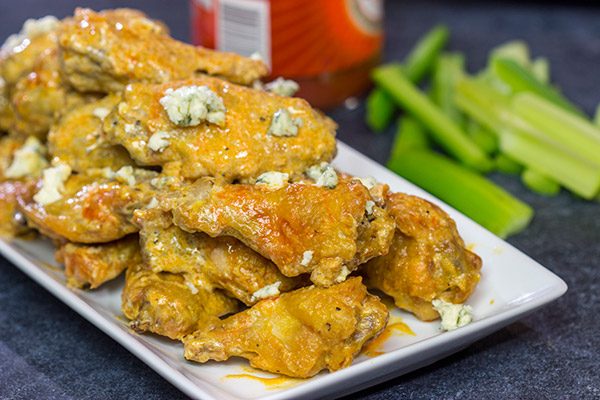 Baked crispy chicken wings.  That's right.  Baked!  These Blue Heat Baked Chicken Wings feature a tasty combination of buffalo sauce and homemade blue cheese dressing.