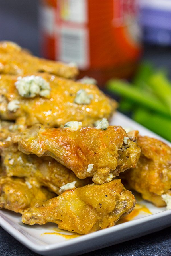 Baked crispy chicken wings.  That's right.  Baked!  These Blue Heat Baked Chicken Wings feature a tasty combination of buffalo sauce and homemade blue cheese dressing.